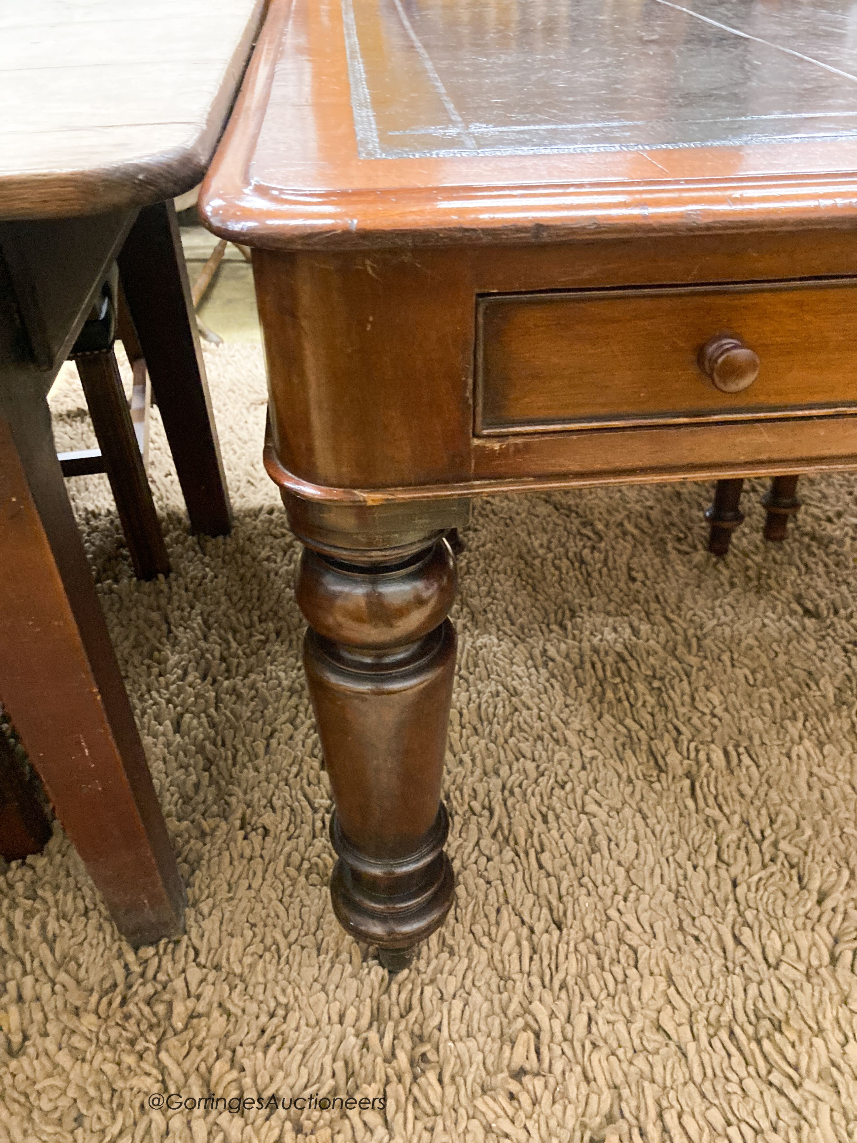 A Victorian mahogany partner's writing table with black leather inset top, length 180cm, depth 102cm, height 72cm